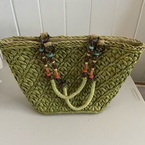 Barney’s New York green straw purse